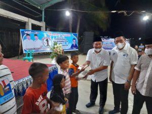 Pasangan Calon Nomor urut satu Walikota dan Wakil Walikota Sibolga, H.Jamaluddin Pohan dan Pantas Maruba Lumbantobing menyerahkan santunan kepada anak yatim piatu dalam rangka memperingati Maulid Nabi Muhammad SAW 1442 Hijriah