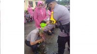 Polres Padang Lawas Gelar Upacara Kenaikan Pangkat, Kapolres Palas Siram Air Bunga Kepada 23 Personil