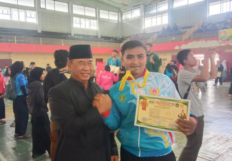 Ikhsan Tampil Perkasa Diarena Pencak Silat Porkot Medan 2024