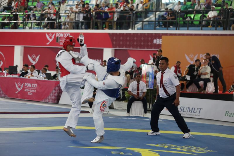 Atlet-Atlet Taekwondo Berebut Medali Emas di Hari Terakhir Kyorugi PON XXI Aceh-Sumut 2024