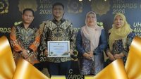 Bupati Labura Hendri Yanto Sitorus Raih UHC Award Tingkat Pratama