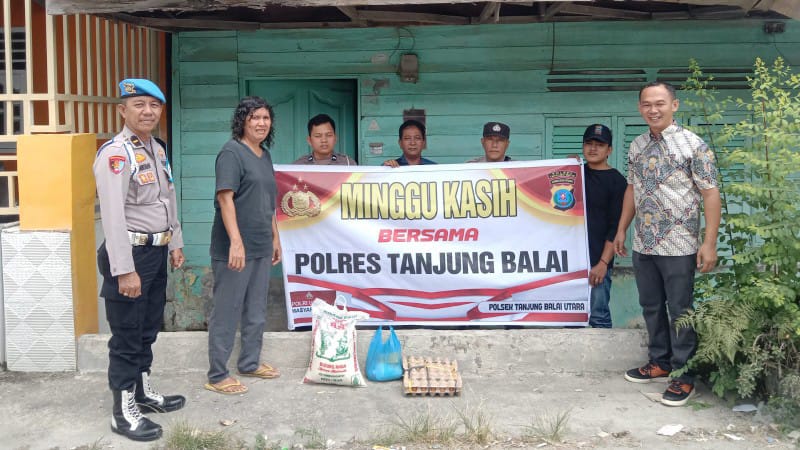 Polsek Tanjungbalai Utara Gelar “Minggu Kasih”, Bagikan Sembako untuk Warga Kuala Silo Bestari