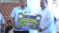 May Day 2026: Dari Seremoni ke Aksi Nyata Perlindungan Pekerja di Sumatera Utara, Bupati Asahan Terima 1.700 BPJS Ketenagakerjaan