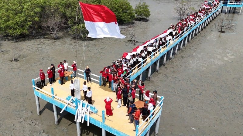 Wakil Bupati Asahan Kobarkan Semangat Kemerdekaan Lewat Kirab Merah Putih di Desa Silo Baru